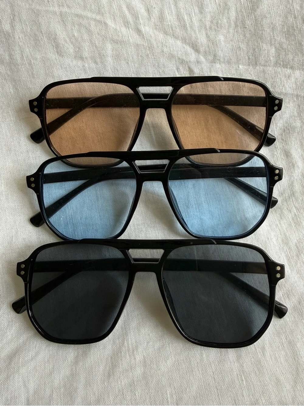 Aviator-Style Black Frame Sunglasses Trio with Brown, Blue, and Black Lenses